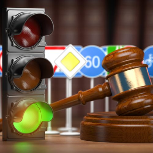 Traffic law concept. Judge gavel with traffic lights and traffic signs. 3d illustration